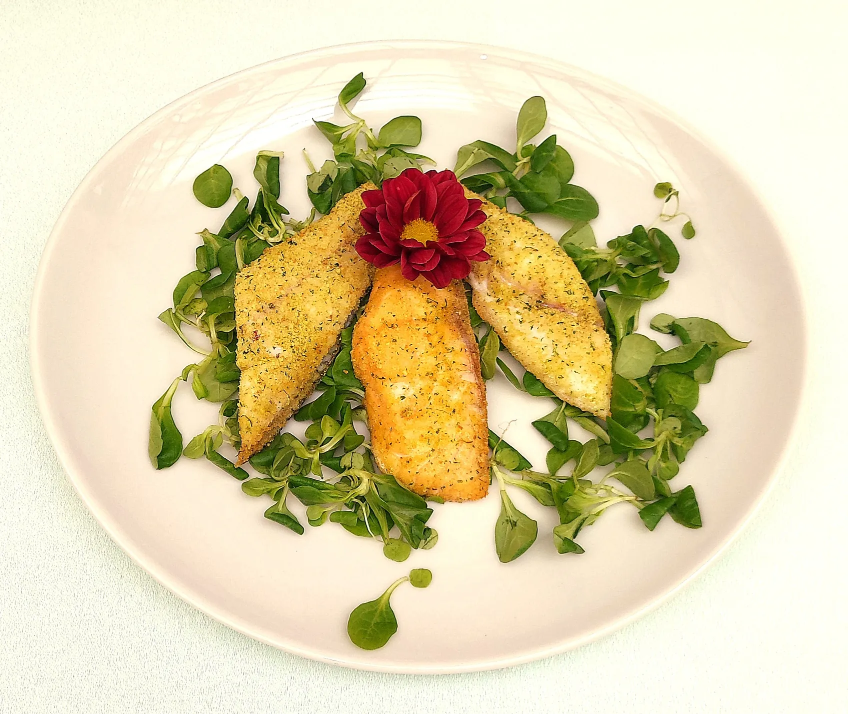 Filetti di pesce gratinati - branzino, orata e salmone